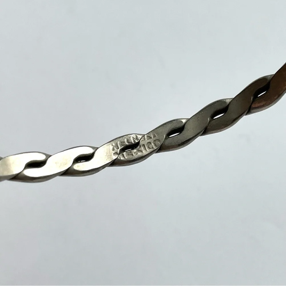 Pair of vintage unmarked sterling? flat twist link Mexico bangle bracelets